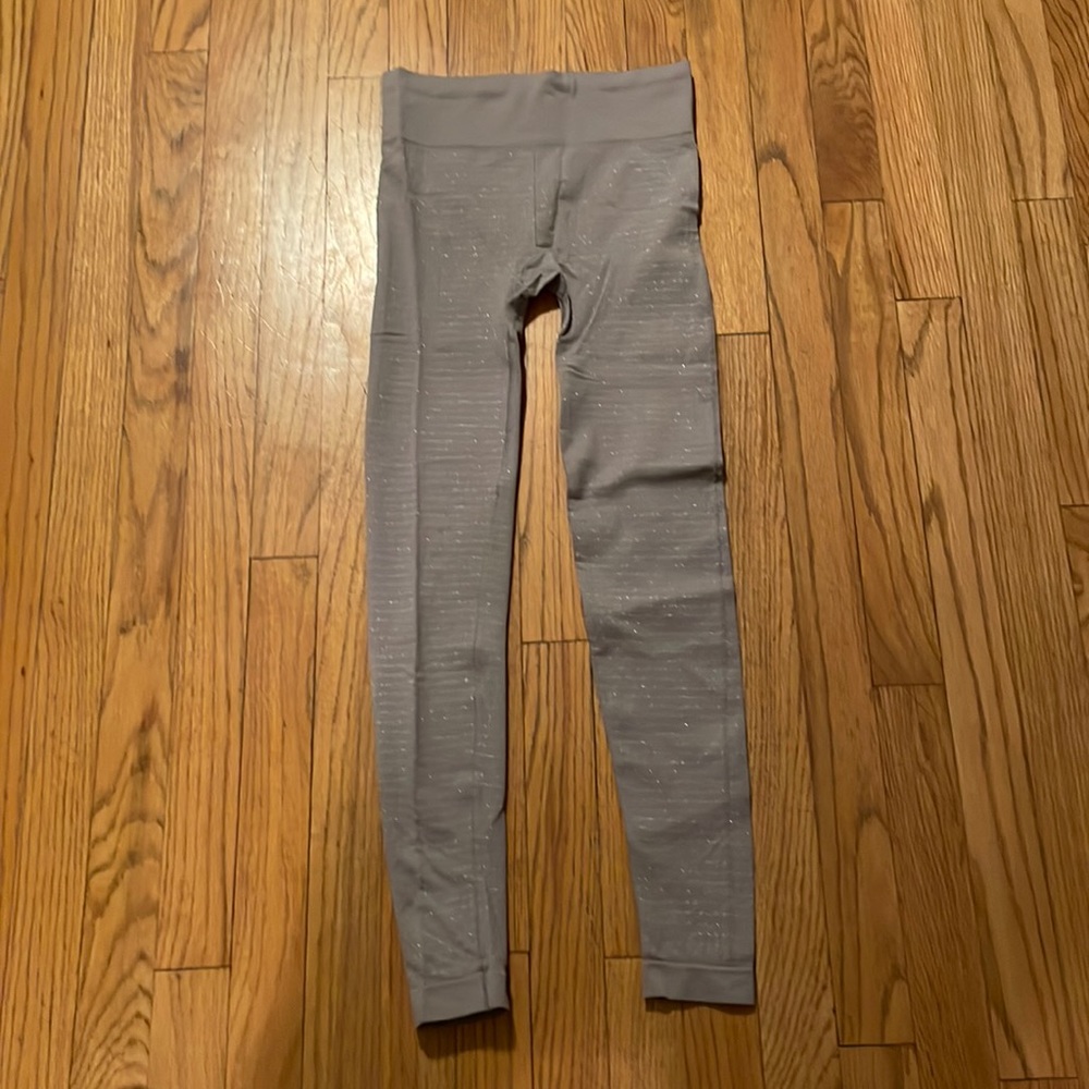 Athleta tan leggings with silver sparkly stripes long length